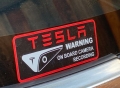TESLA security camera sticker